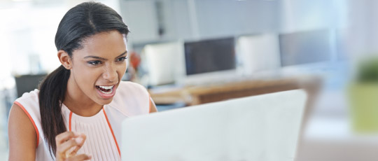 Angry woman on laptop